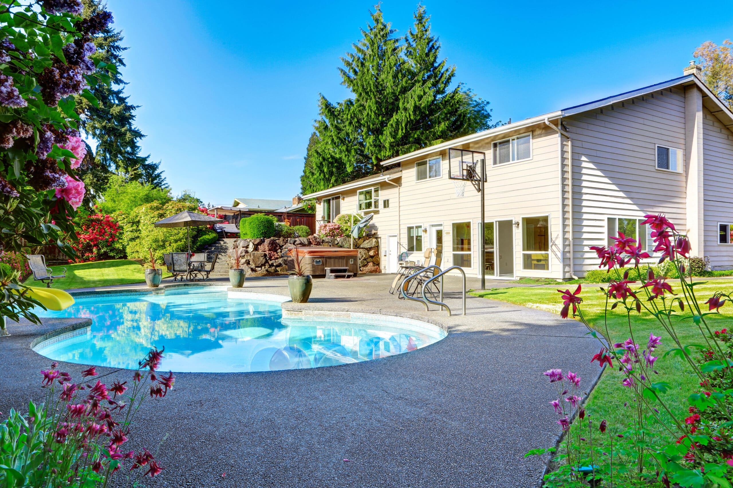Backyard with small beautiful swimming pool have a custom designed swimming pool